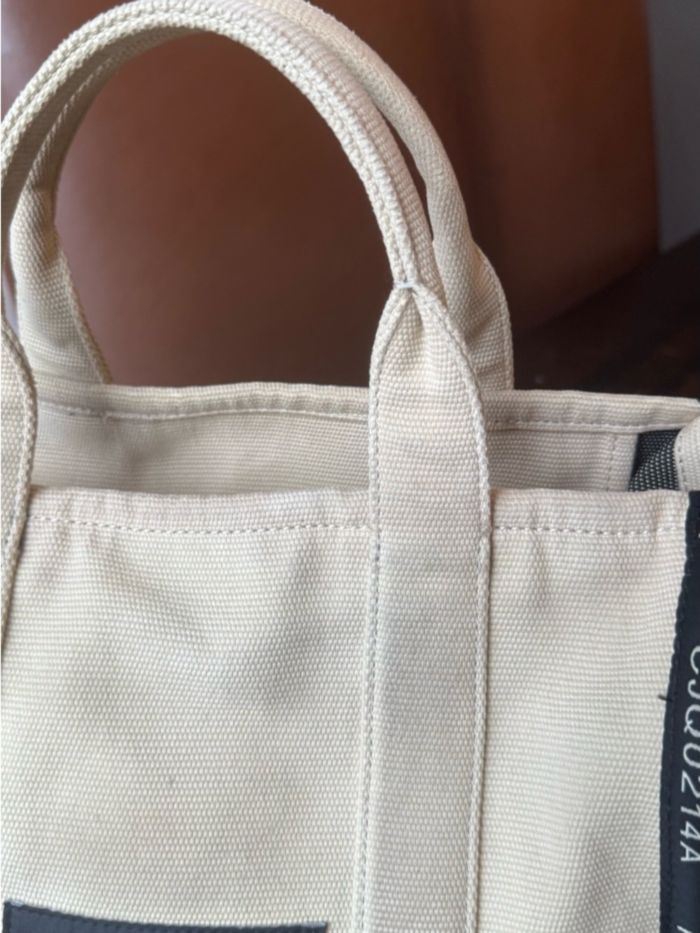 Marc Jacobs Cream Canvas 'The Tote Bag' with Black Logo - Picture 13 of 13